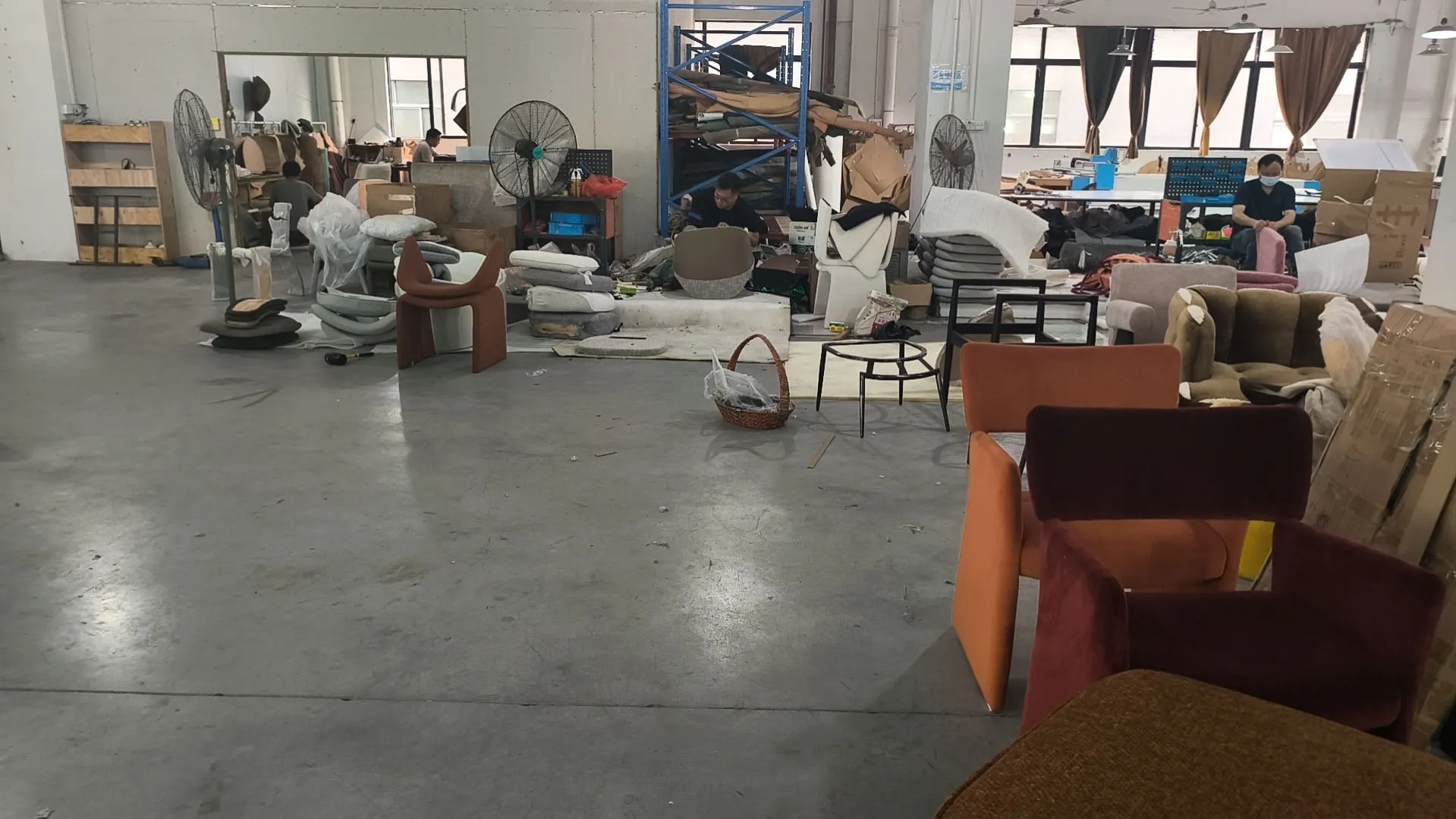 Inspecting furniture components and raw materials during factory visit in China